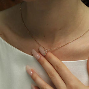 Angel's Embrace Cross Necklace