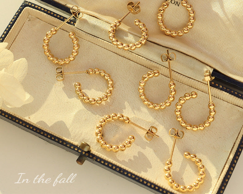 Beadie Huggie Earrings Stella Harte