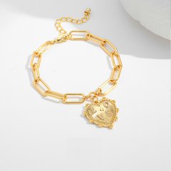 The Golden Heart Charm Bracelet