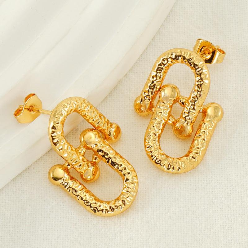 Leo Dangle Earrings Stella Harte