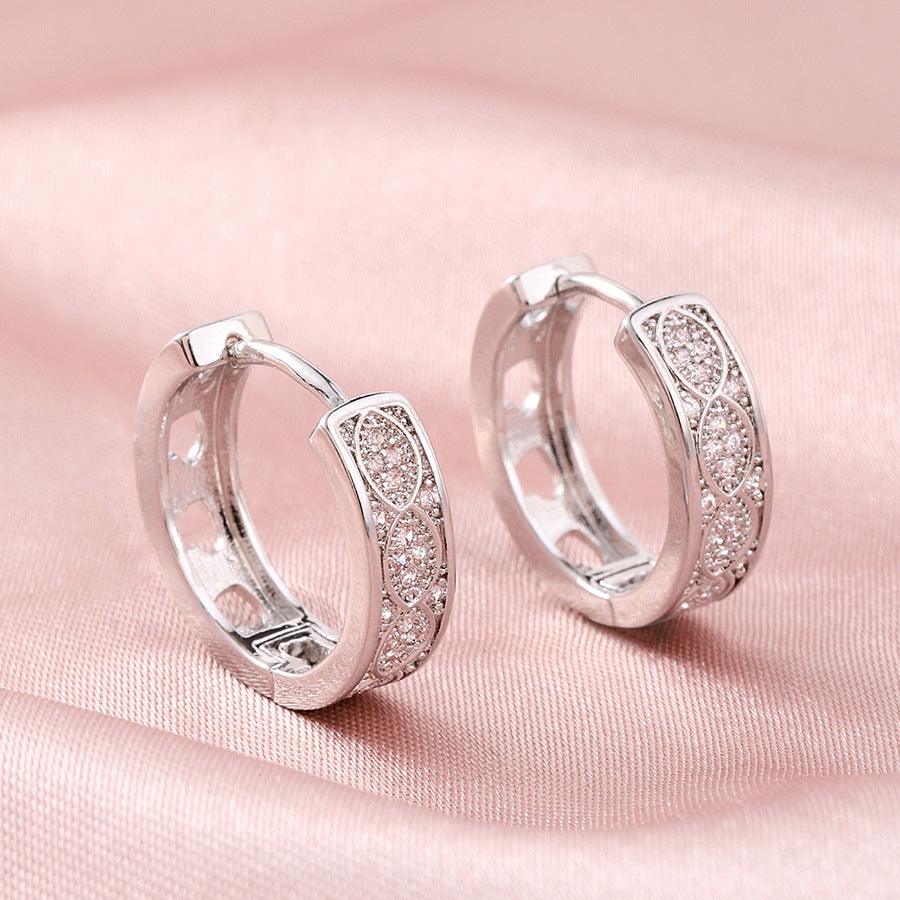 Vivienne Huggie Huggie Earrings Stella Harte