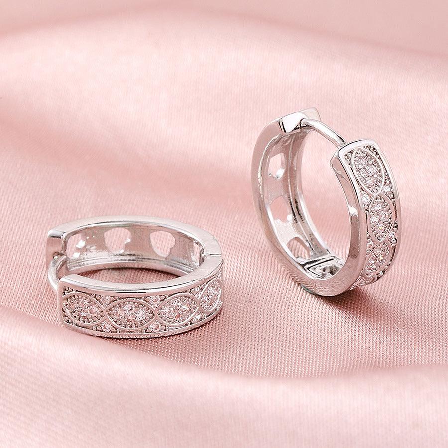 Vivienne Huggie Huggie Earrings Stella Harte