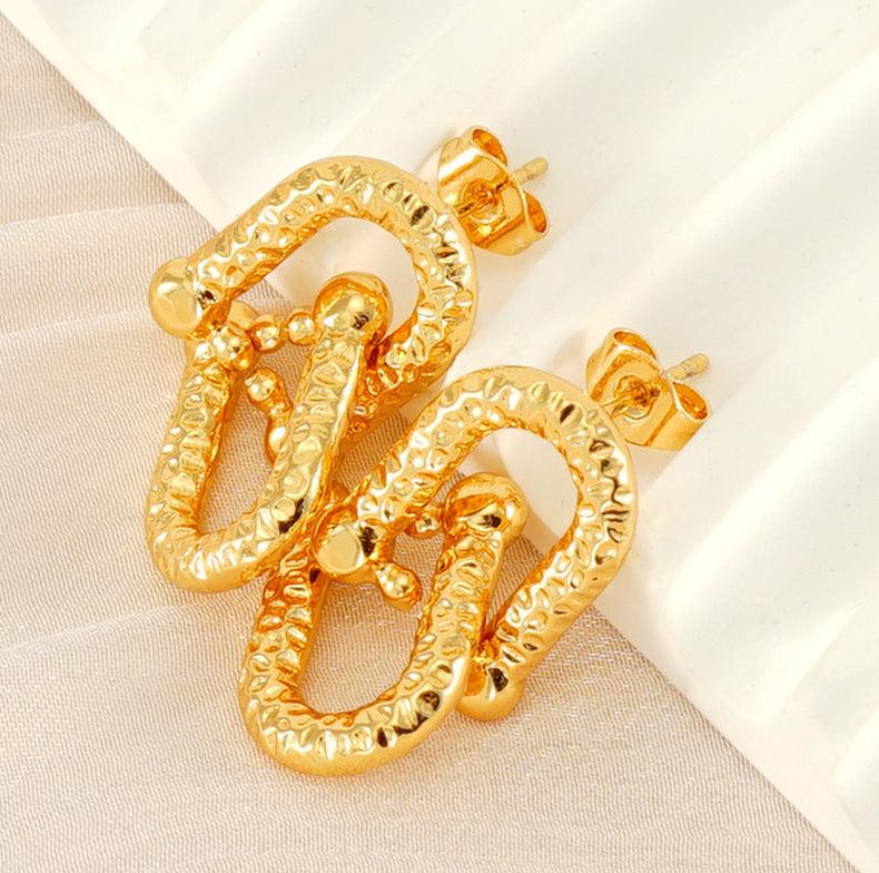 Leo Dangle Earrings Stella Harte