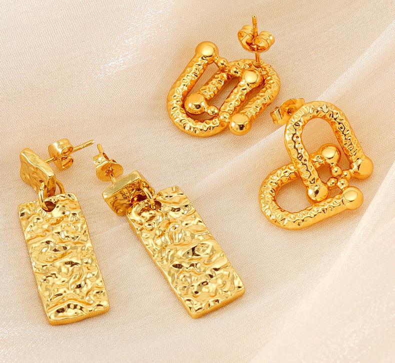 Leo Dangle Earrings Stella Harte