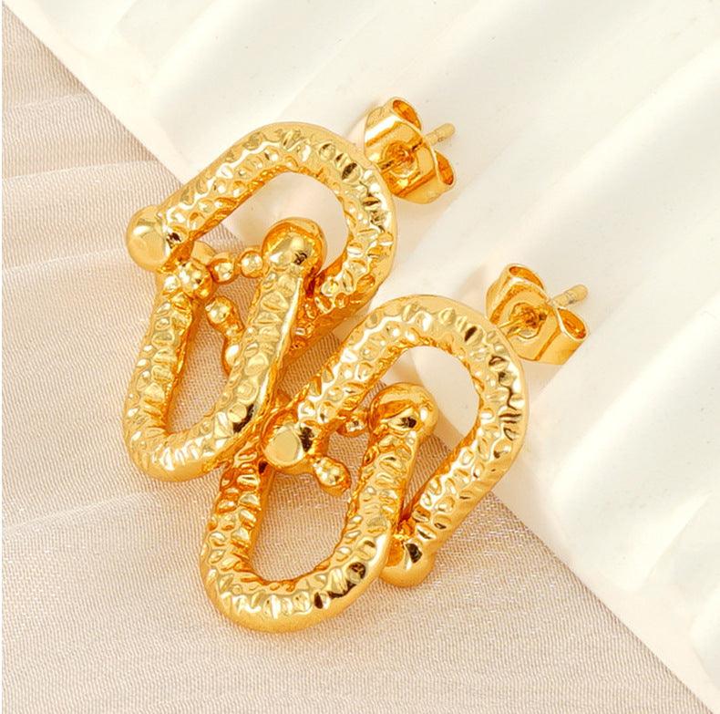 Leo Dangle Earrings Stella Harte